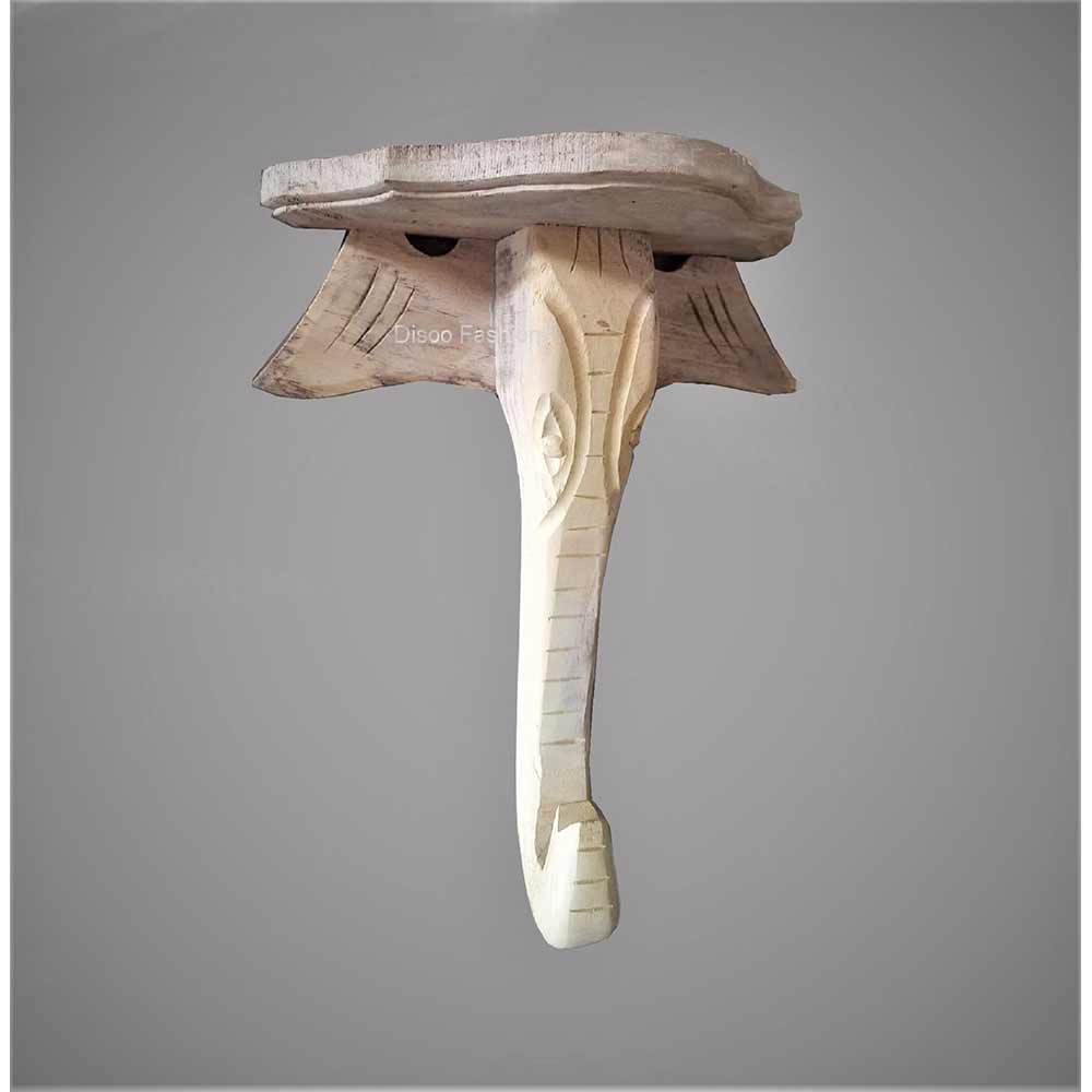 Wall Shelf In Natural Wooden Colour elephant trunk figurine handcarved wooden artifact or wall shelf.Ganesha design By Disoo Fashions, Wall Shelf - IM2206